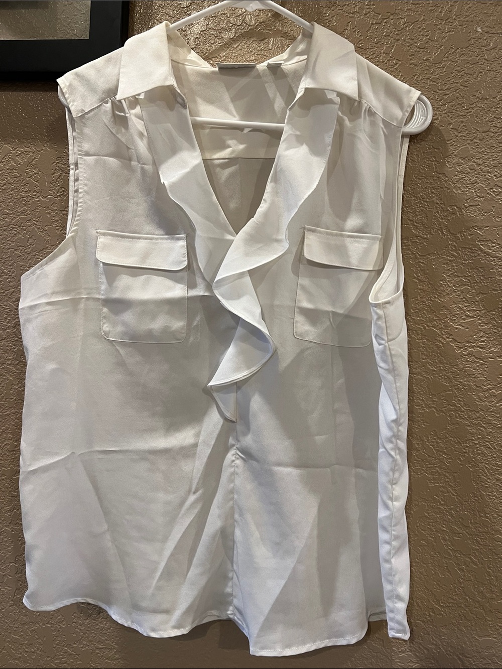 Ruffled sleeveless top